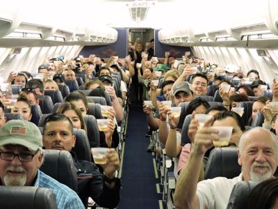 A champagne farewell toast from the last Customers to ride on a Southwest 737-500