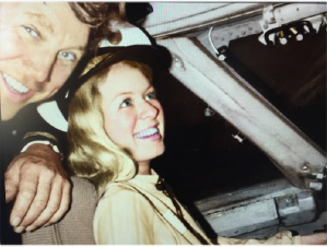 Cindee getting her first look at an airplane (Boeing 747) with Captain Lenny Thorell, Pan-Am, LAX, 1976